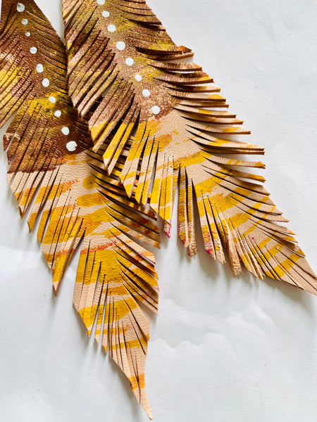 LEATHER FEATHERS