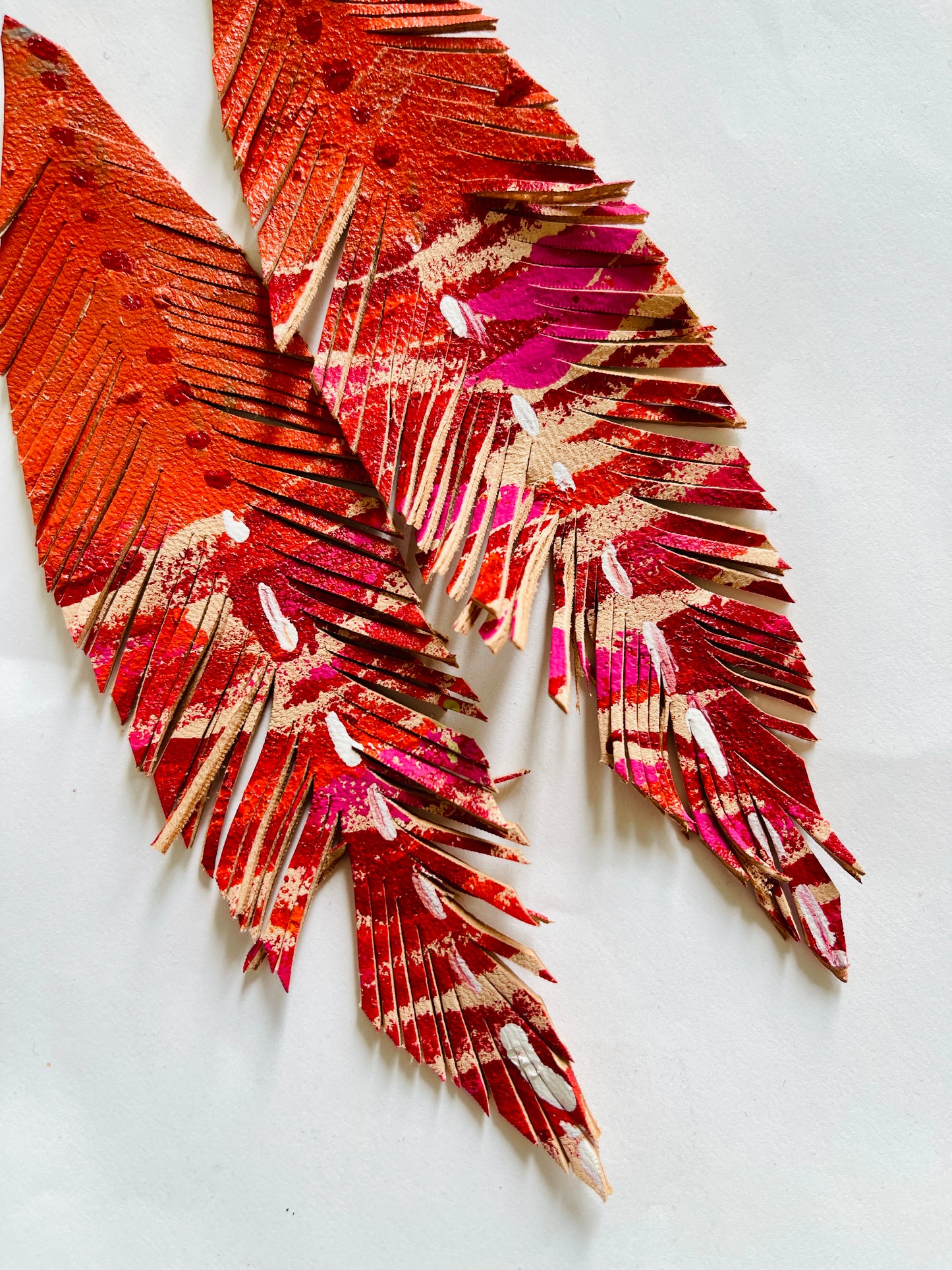 LEATHER FEATHERS