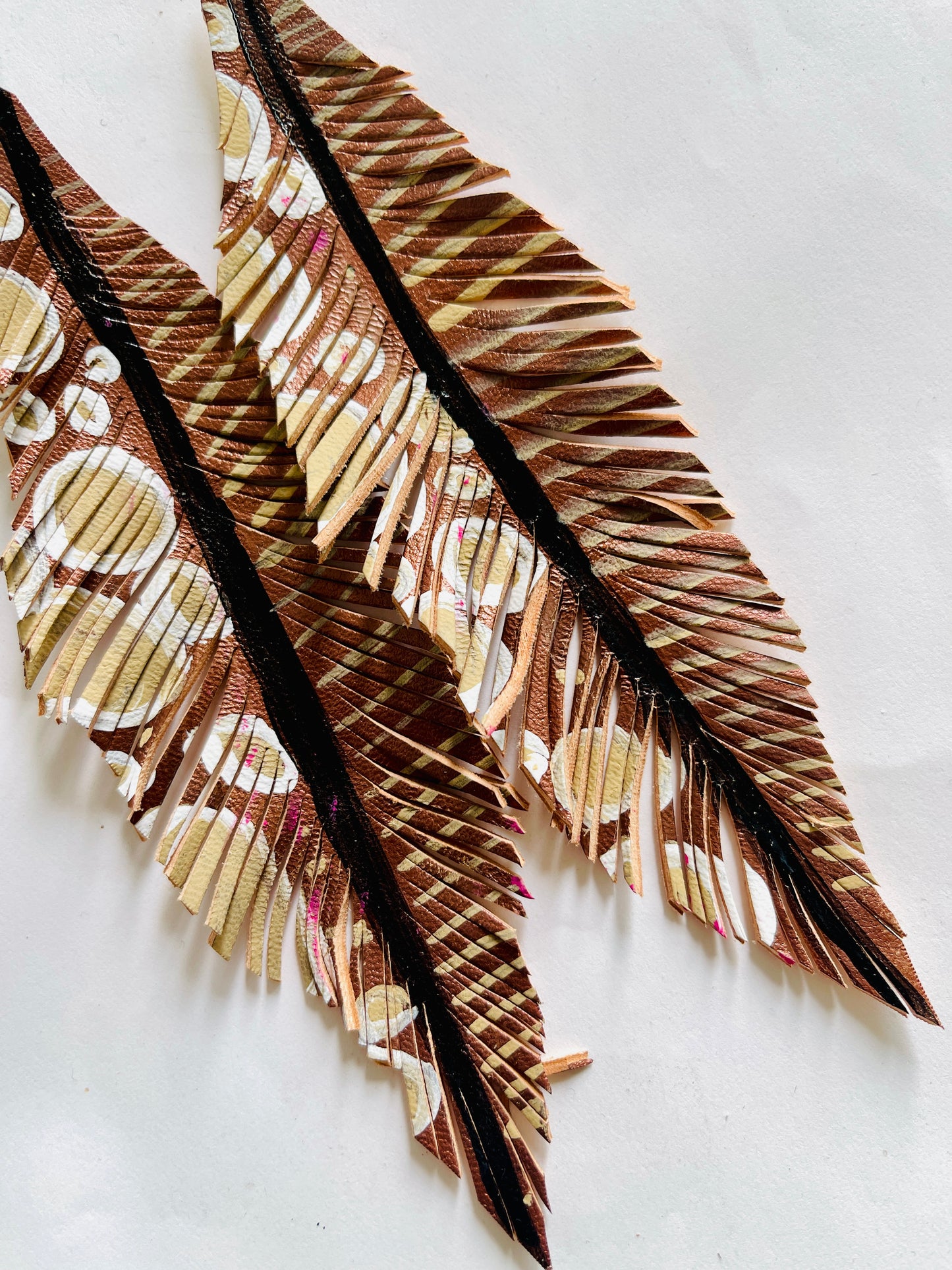 LEATHER FEATHERS